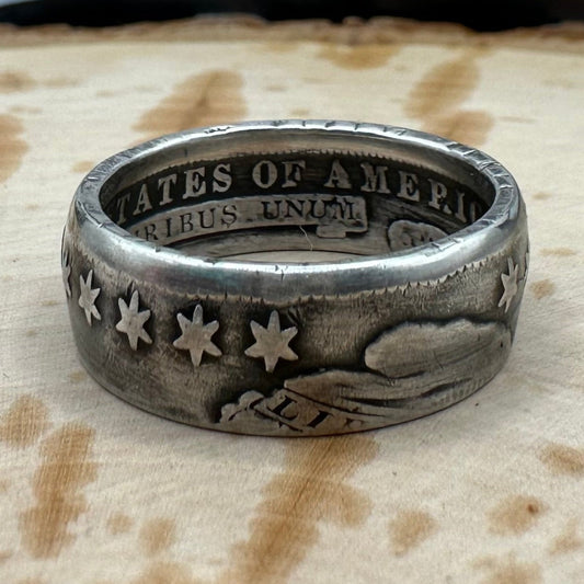 U.S. (Rare) Capped Bust Liberty Silver Half Dollar Coin Ring on a wood background. - Mountainstruck Coin Jewelry