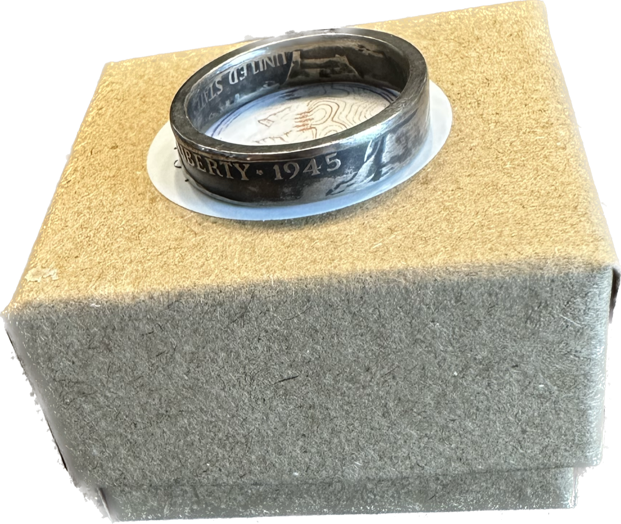 WW2 U.S. Silver Nickel Coin Ring on a brown kraft box.
