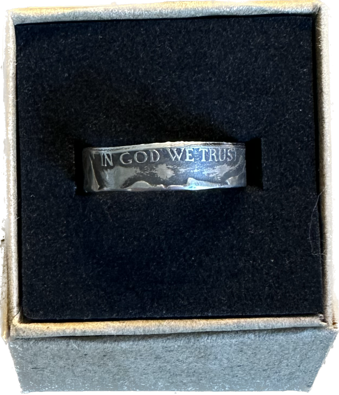 WW2 U.S. Silver Nickel Coin Ring in a brown kraft box on a black velvet background.