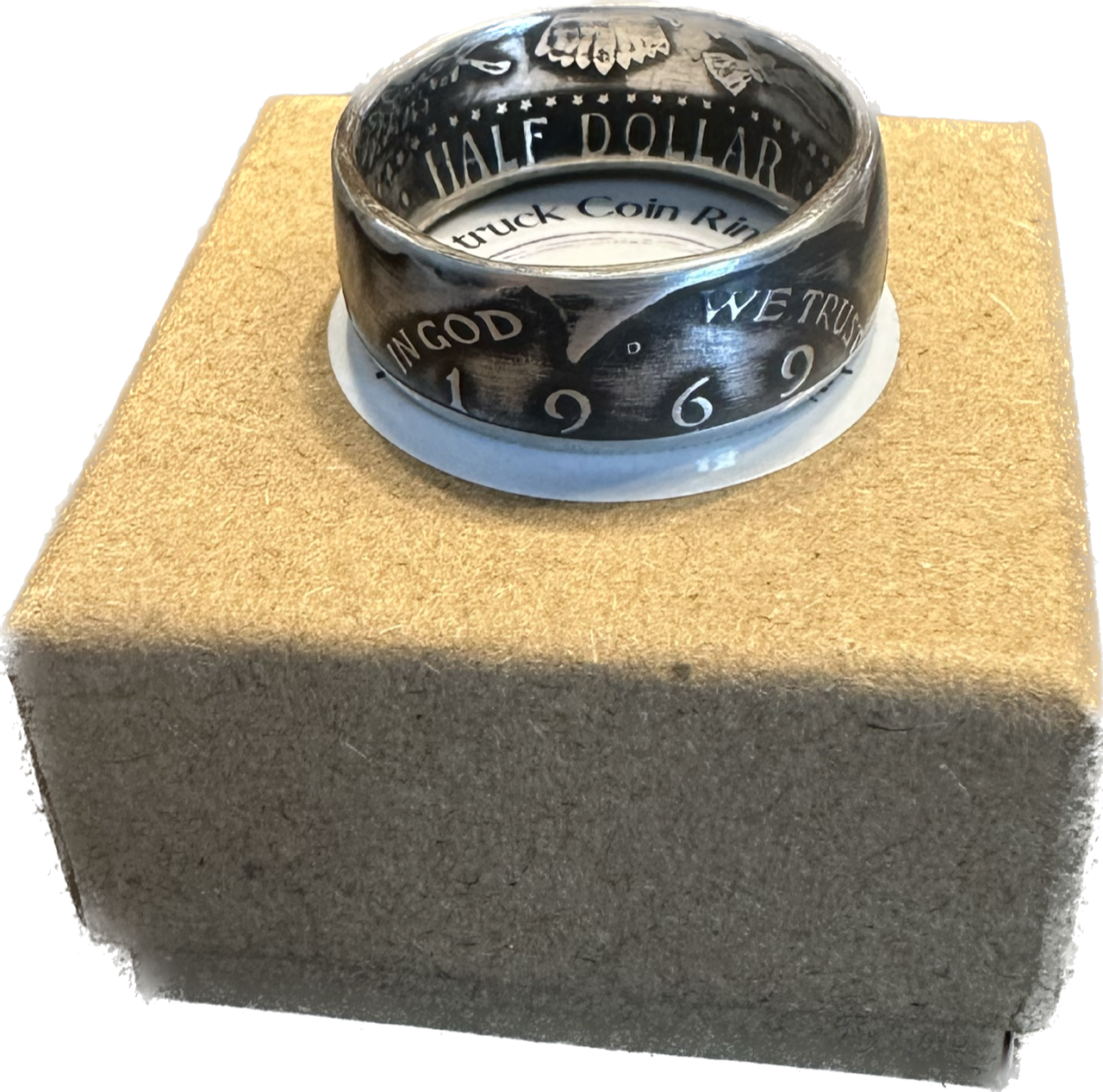JFK Silver Half Dollar Coin Ring (front) on a brown kraft box.