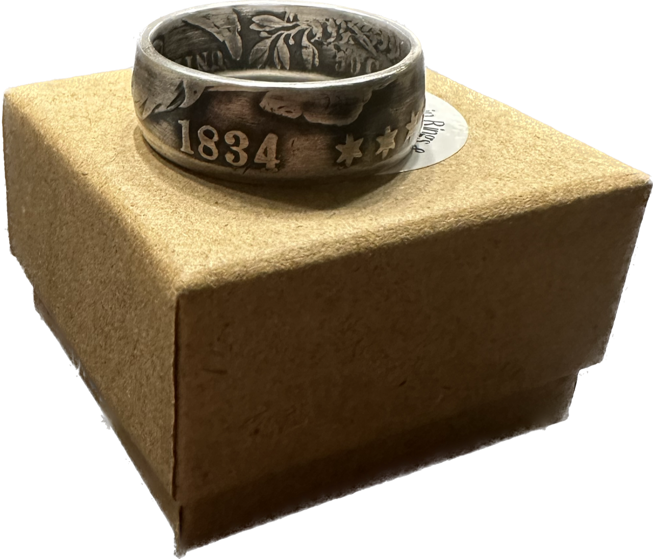 (Rare) Capped Bust Liberty Silver Half Dollar Coin Ring on brown kraft box.