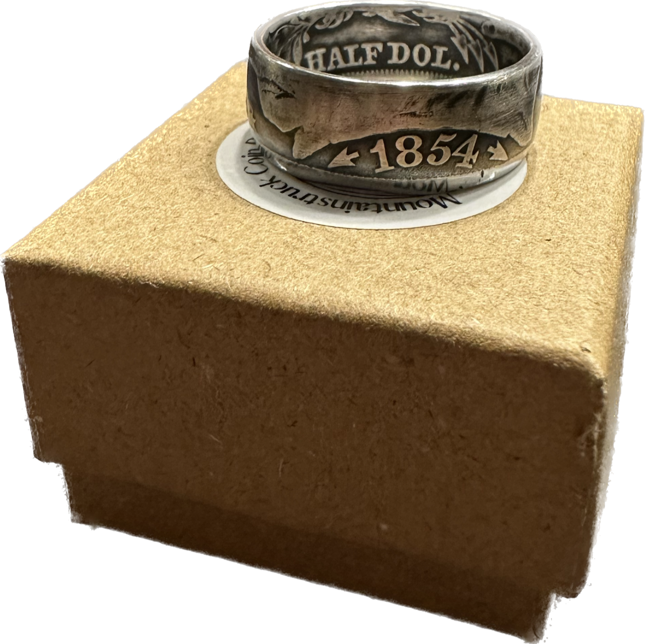 Seated Liberty Silver Half Dollar Coin Ring on a brown kraft box.
