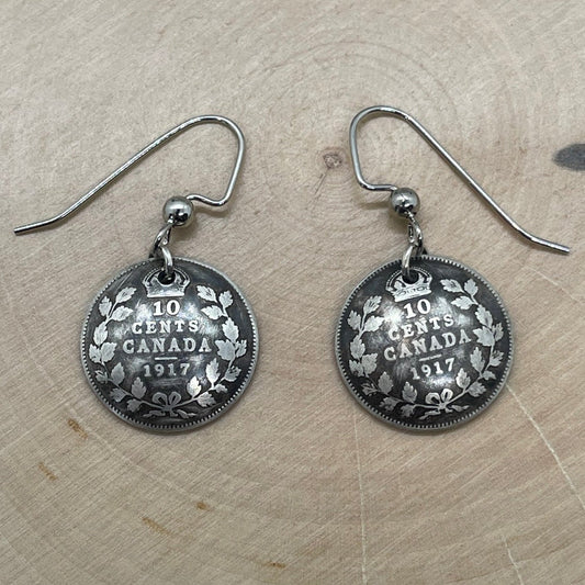 Canada 10 Cents Silver Coin Earrings on a light wood round. - Mountainstruck Coin Jewelry