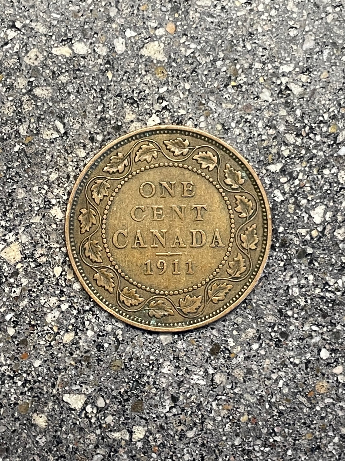 Canada Large Cent Leaf coin (back) on a concrete background. - Mountainstruck Coin Jewelry