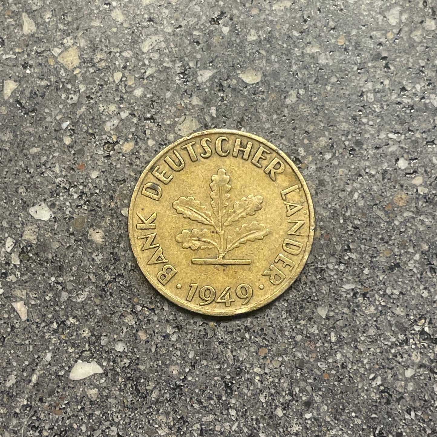 German 5 Pfennig coin front on a concrete background. - Mountainstruck Coin Jewelry