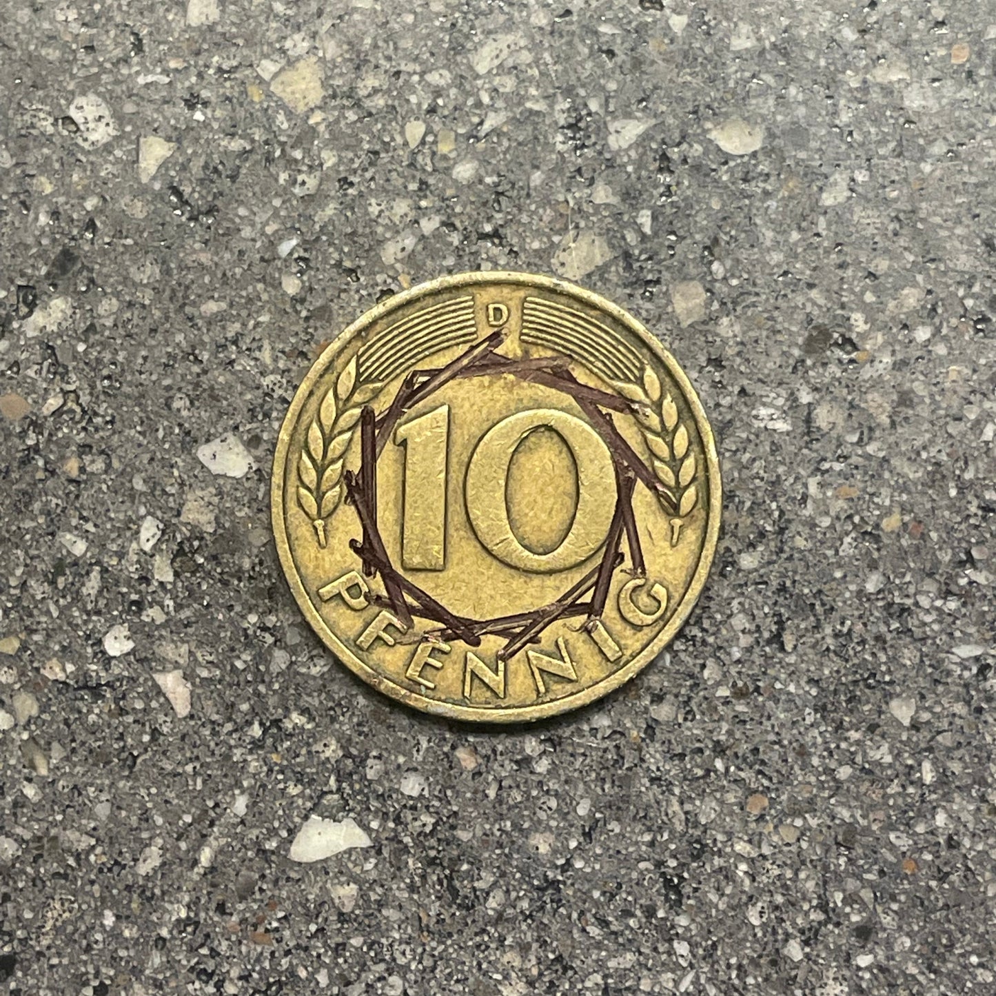 German 5 Pfennig coin back on a concrete background. - Mountainstruck Coin Jewelry