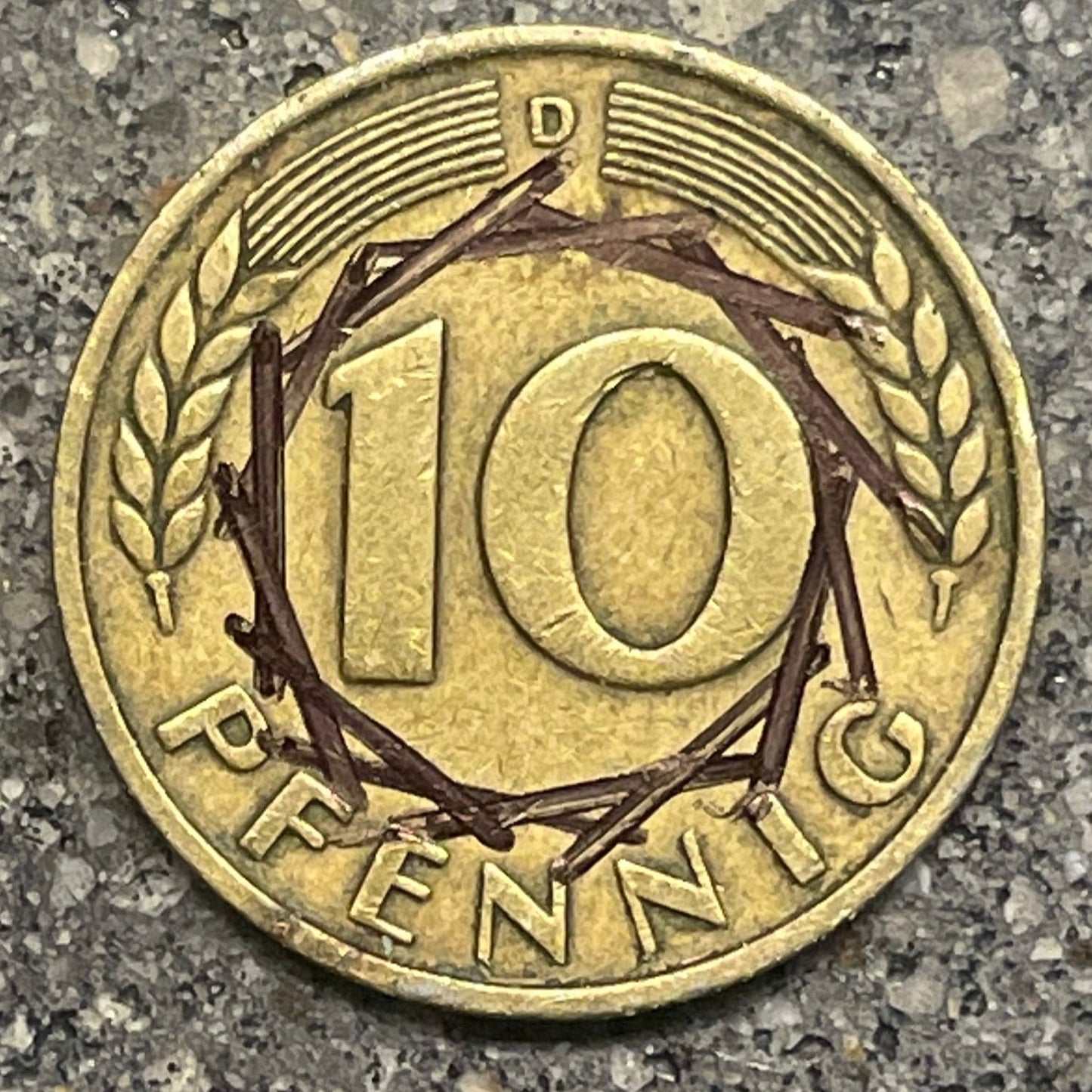 German 5 Pfennig coin back on a concrete background. - Mountainstruck Coin Jewelry