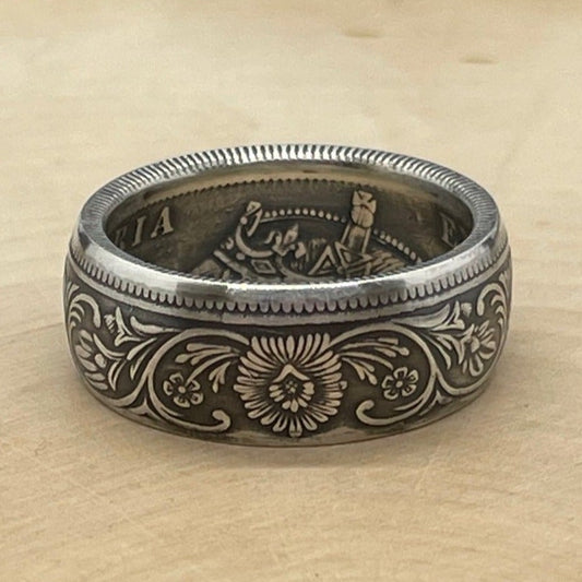 India 1 Rupee Silver Coin Ring (Rare, Victorian) on a light wood round. - Mountainstruck Coin Jewelry