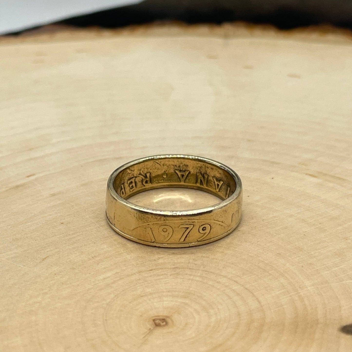 Italy 200 Lire Coin Ring on a light wood round. - Mountainstruck Coin Jewelry