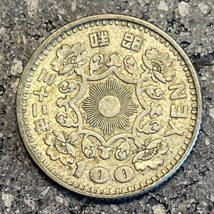 Japan 100 Yen Silver Coin back on a concrete background. - Mountainstruck Coin Jewelry