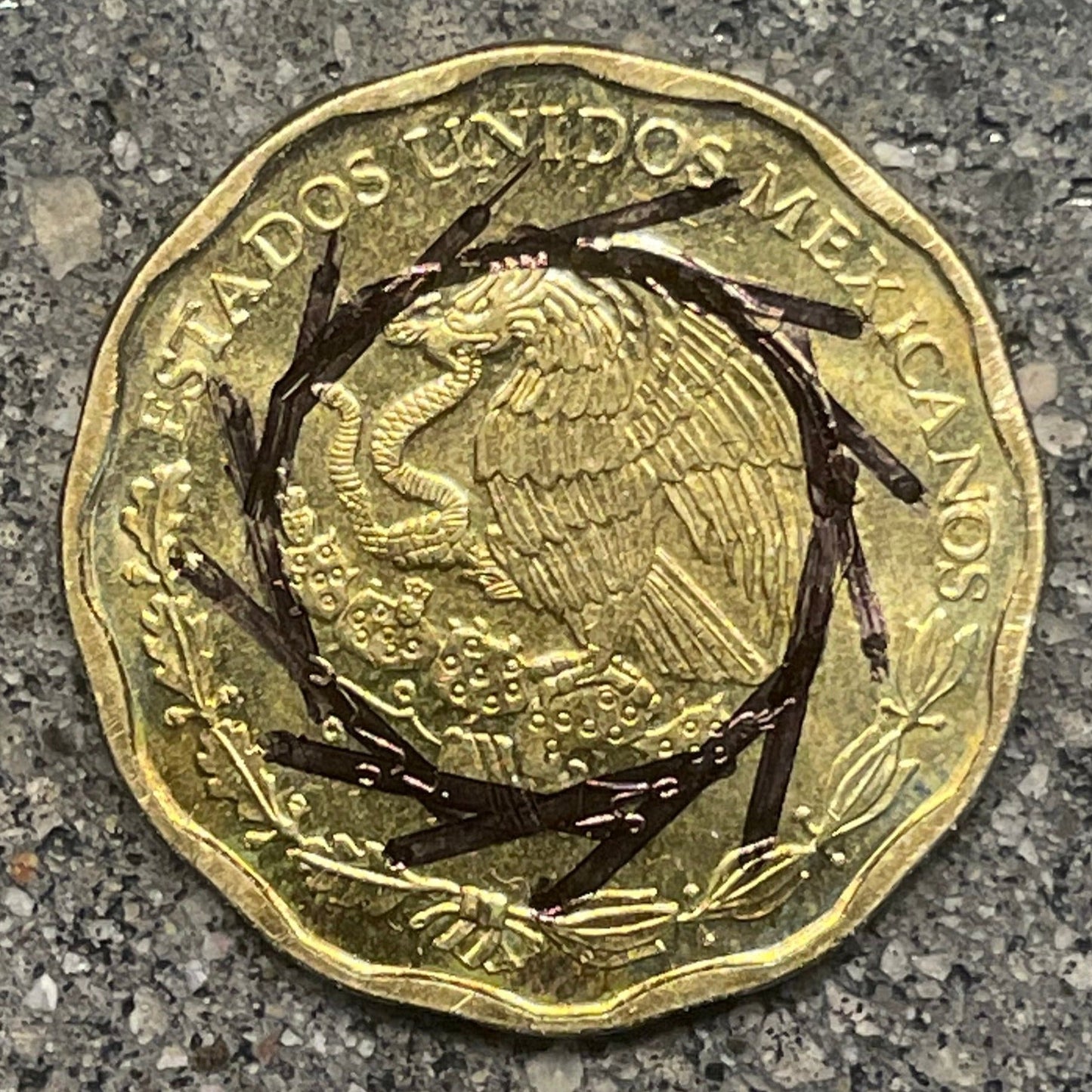 Mexico 50 Centavos Coin front on a concrete background. - Mountainstruck Coin Jewelry