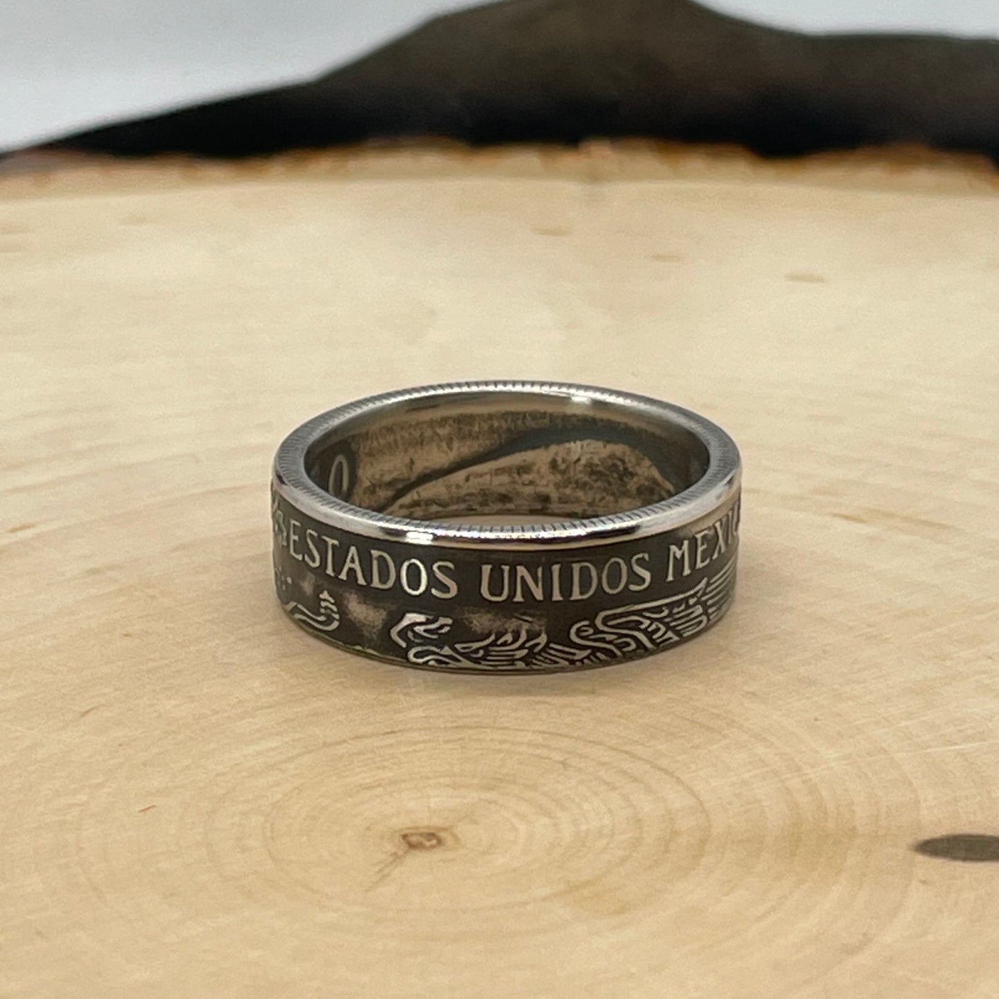 Mexico Peso Coin Ring on a light wood round. - Mountainstruck Coin Jewelry