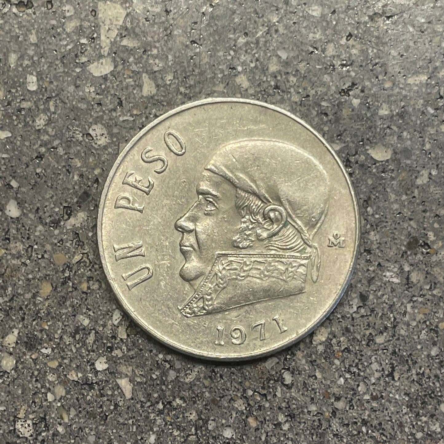 Mexico Peso Coin front on a concrete background. - Mountainstruck Coin Jewelry