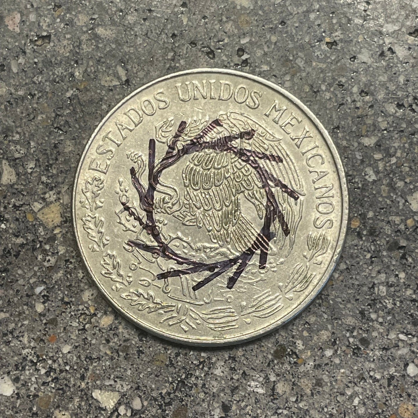 Mexico Peso Coin back on a concrete background. - Mountainstruck Coin Jewelry