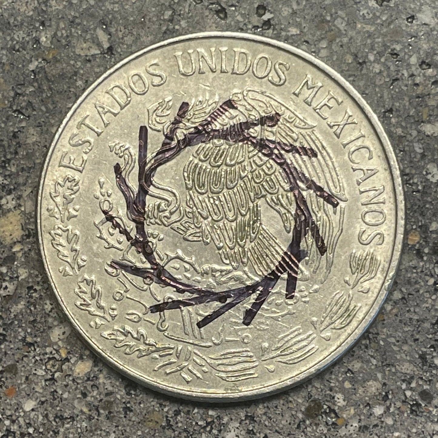 Mexico Peso Coin back on a concrete background. - Mountainstruck Coin Jewelry