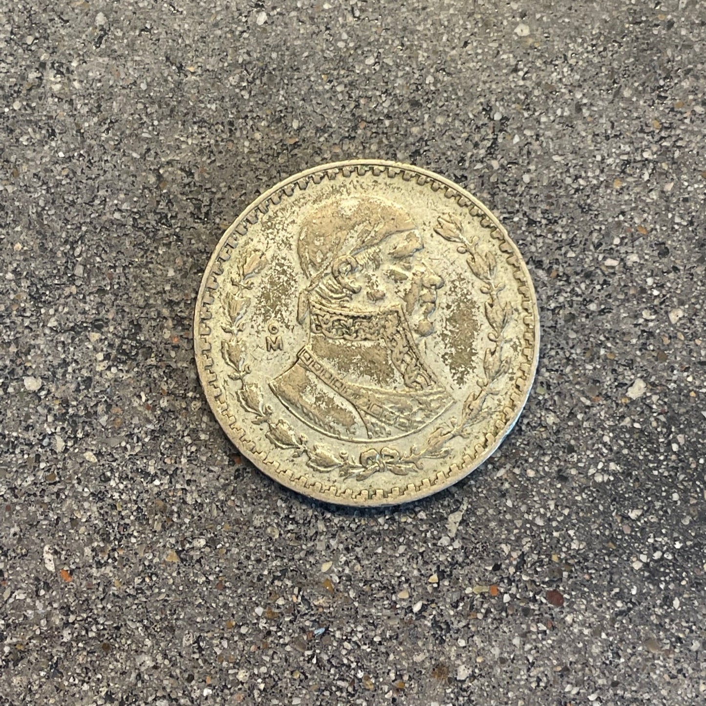 Mexico Silver Peso Coin front on a concrete background. - Mountainstruck Coin Jewelry