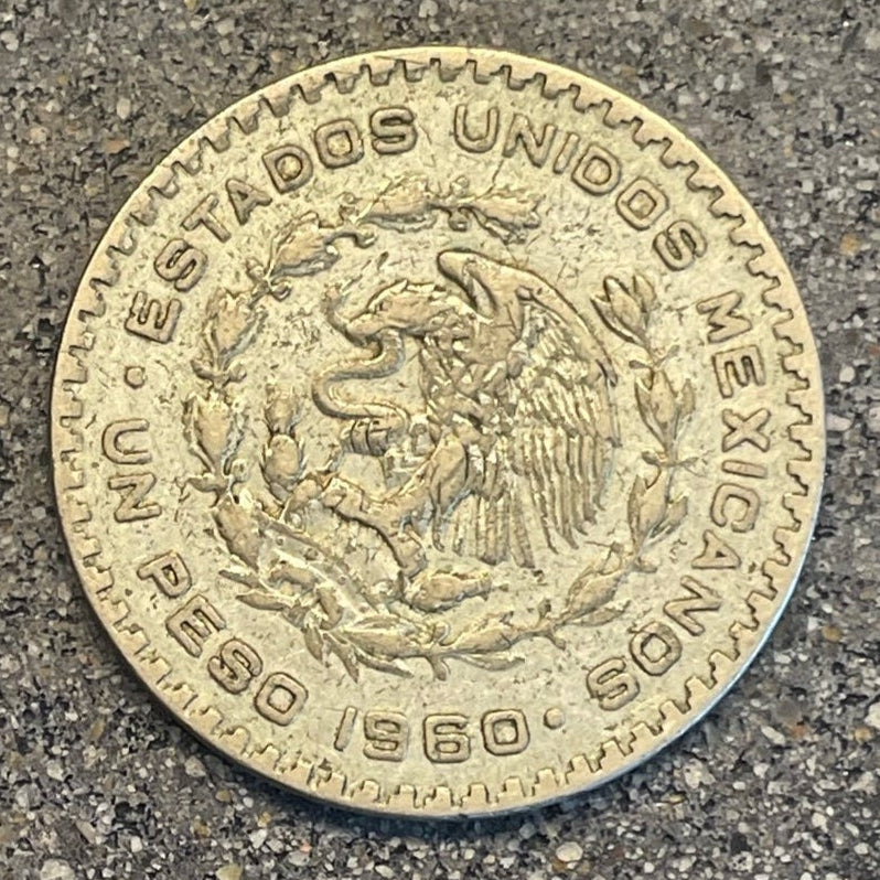 Mexico Silver Peso Coin back on a concrete background. - Mountainstruck Coin Jewelry