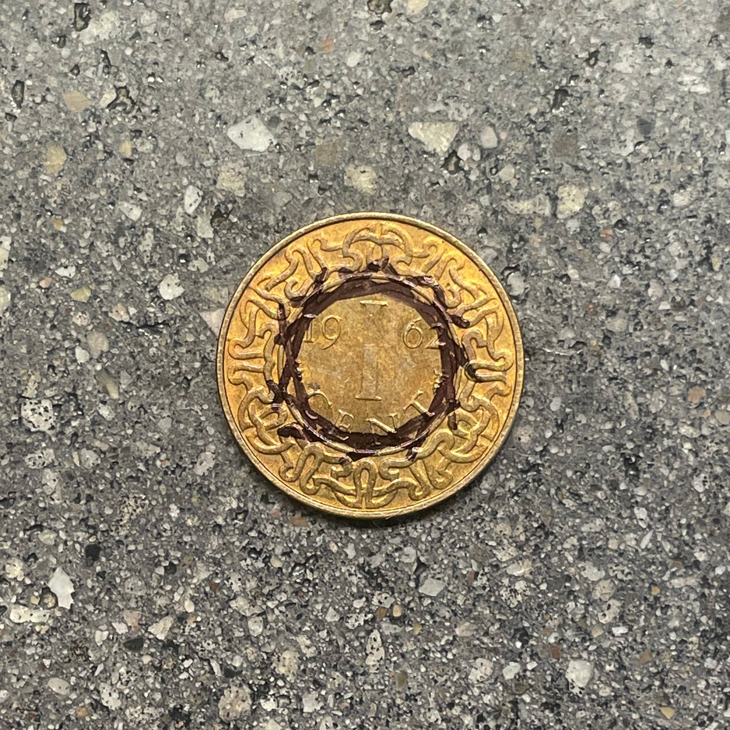 Suriname 1 Cent Coin back on a concrete background. - Mountainstruck Coin Jewelry
