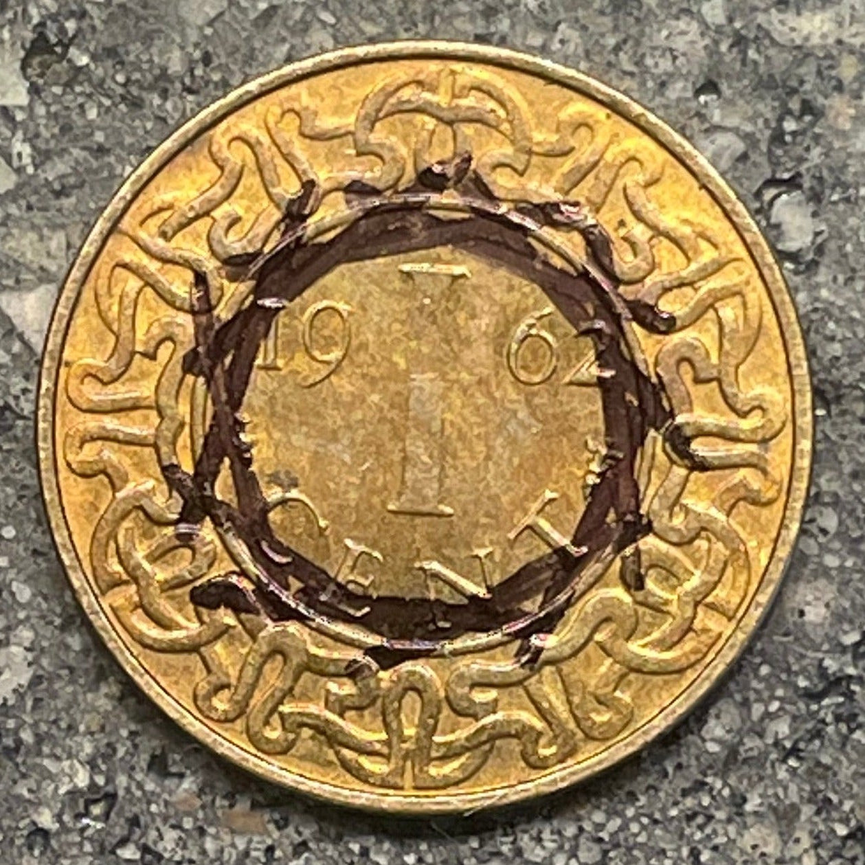 Suriname 1 Cent Coin back on a concrete background. - Mountainstruck Coin Jewelry
