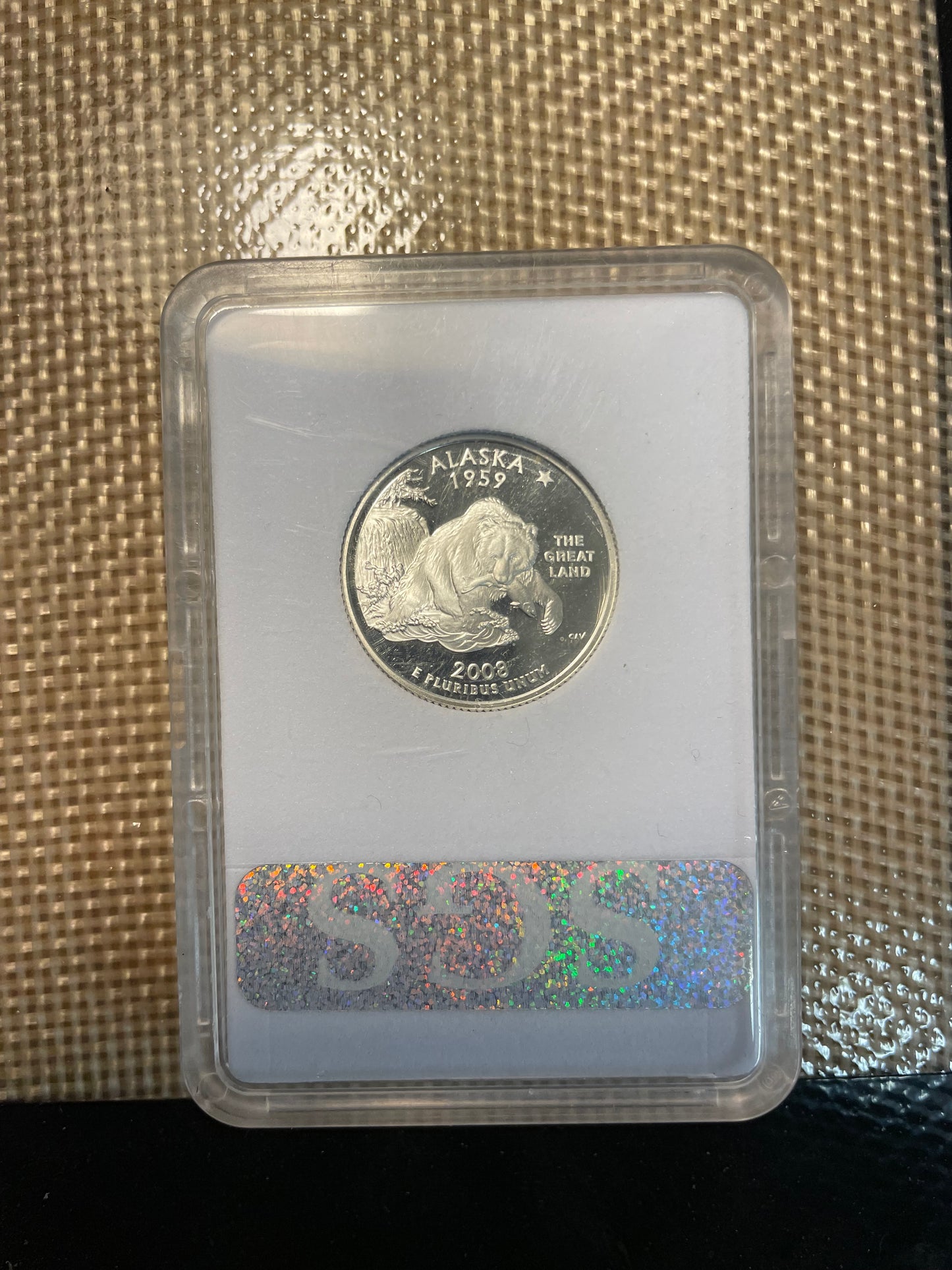 U.S. State Quarter Silver Coin Ring featuring Alaska in a plastic verification case. - Mountainstruck Coin Jewelry