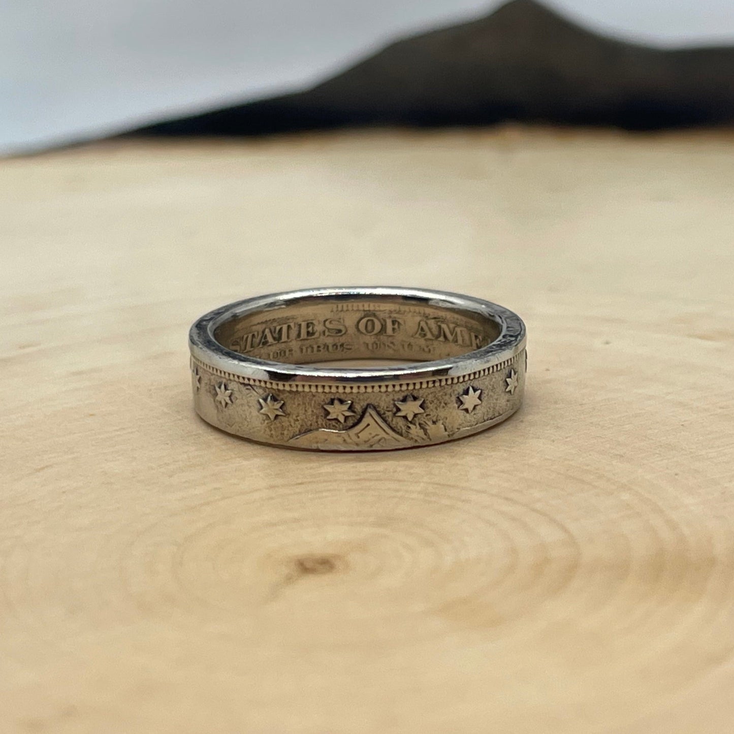 "V" Nickel Coin Ring on wood round - Mountainstruck Coin Jewelry