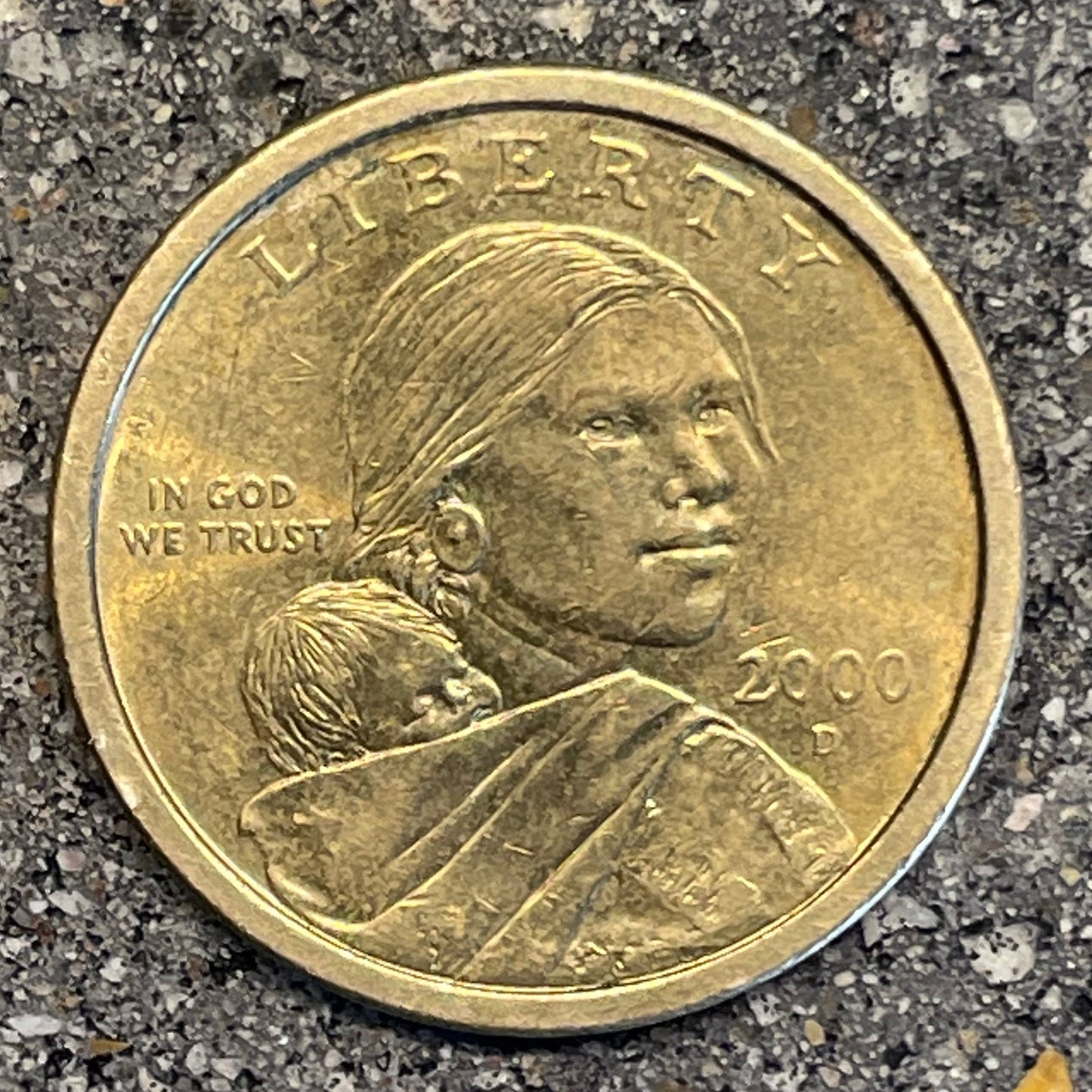 U.S. Sacagawea Dollar Coin front on a concrete background. - Mountainstruck Coin Jewelry