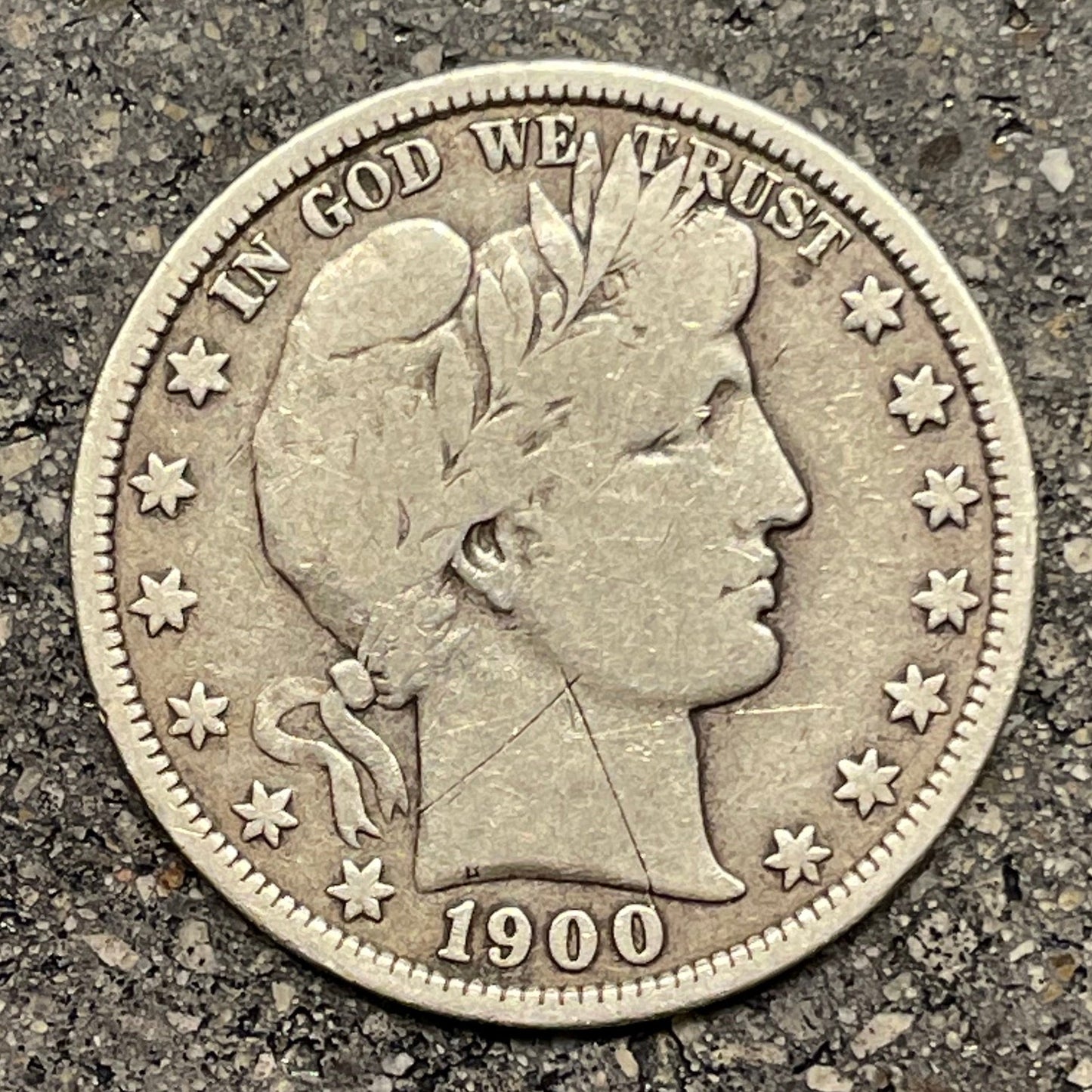 U.S. Barber Silver Half Dollar front of coin on a concrete background. - Mountainstruck Coin Jewelry
