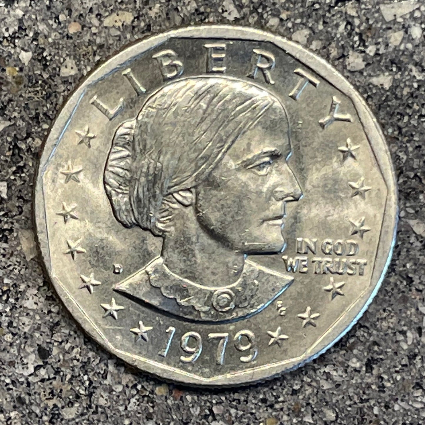 U.S. Susan B. Anthony Dollar Coin front on a concrete background. - Mountainstruck Coin Jewelry