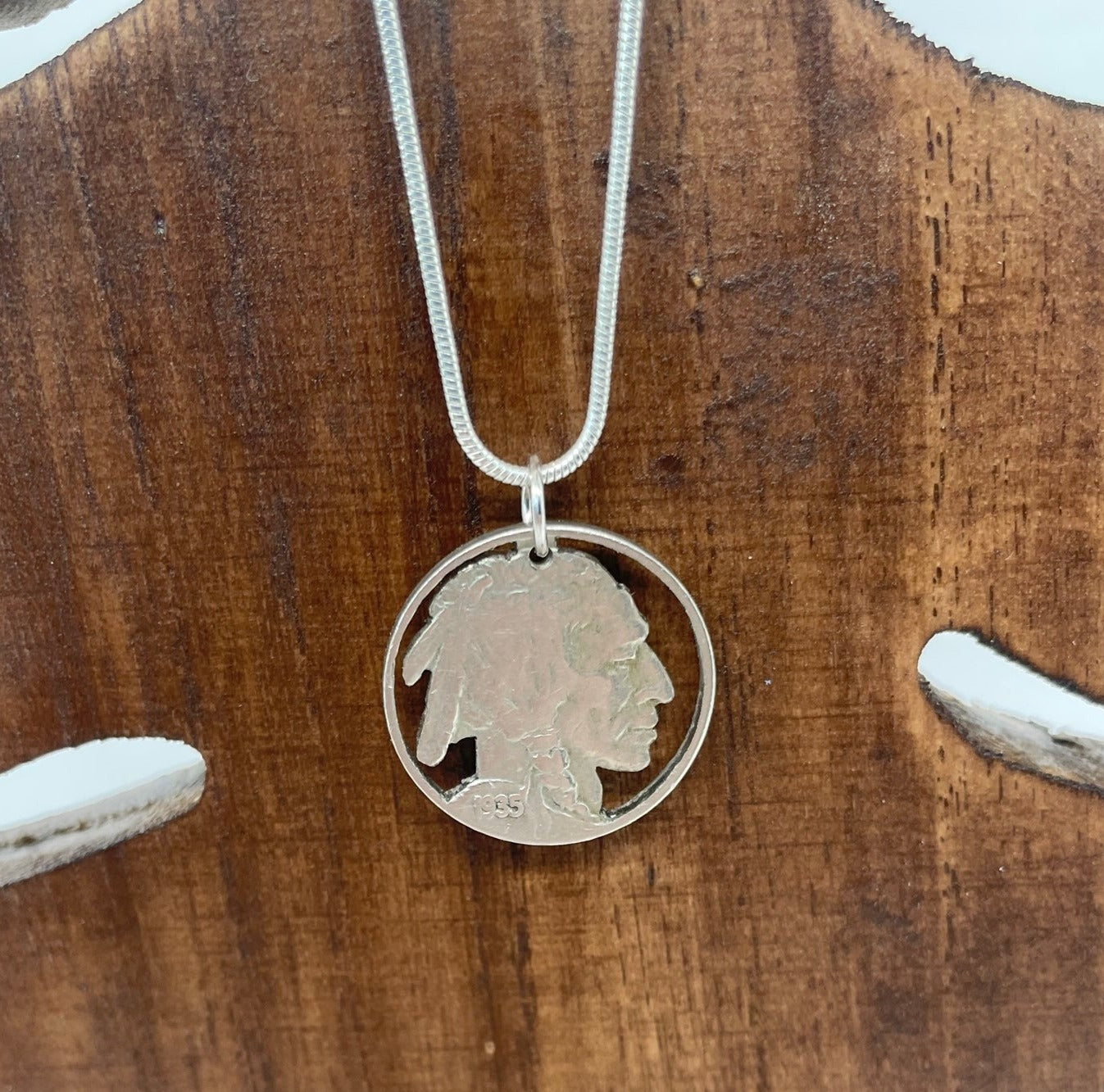 U.S. Buffalo Nickel (Front) Coin Necklace with a snake chain on a wood tree background.