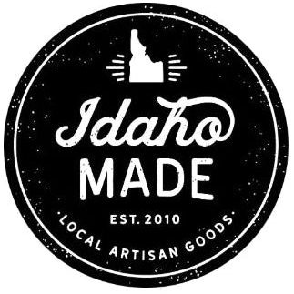 Round black Idaho Made logo with ID outline and text "Est. 2010" and "Local Artisan Goods". - Mountainstruck Coin Jewelry