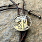 U.S. Walking Liberty Half Dollar Hand Cut Silver Coin Bolo Tie on a grey rock surface. - Mountainstruck Coin Jewelry