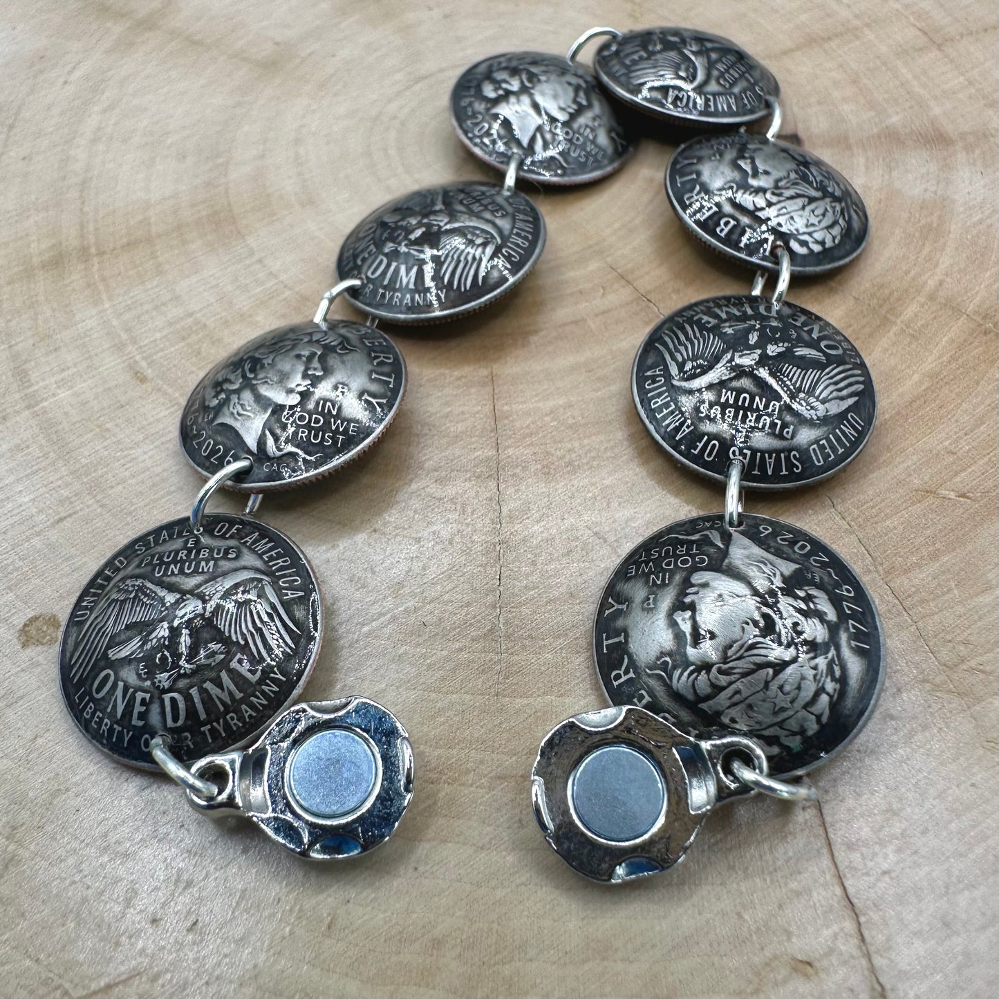 Handmade U.S. 2026 "Liberty" Dime Domed Coin Bracelet with magnetic clasp on a wood round. - Mountainstruck Coin Jewelry