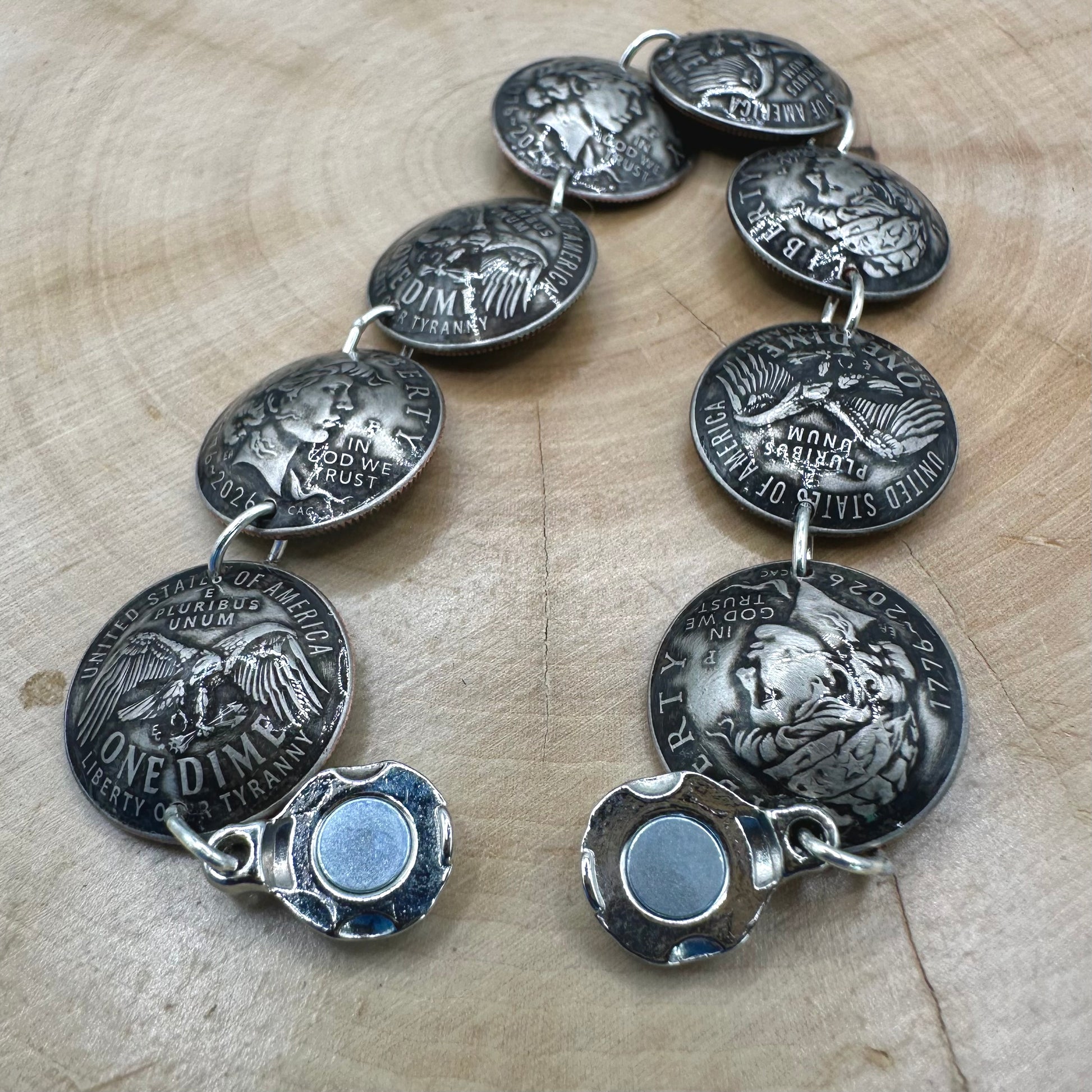 Handmade U.S. 2026 "Liberty" Dime Domed Coin Bracelet with magnetic clasp on a wood round. - Mountainstruck Coin Jewelry