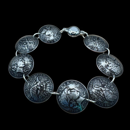 Handmade U.S. 2026 "Liberty" Dime Domed Coin Bracelet with magnetic clasp on a black background. - Mountainstruck Coin Jewelry