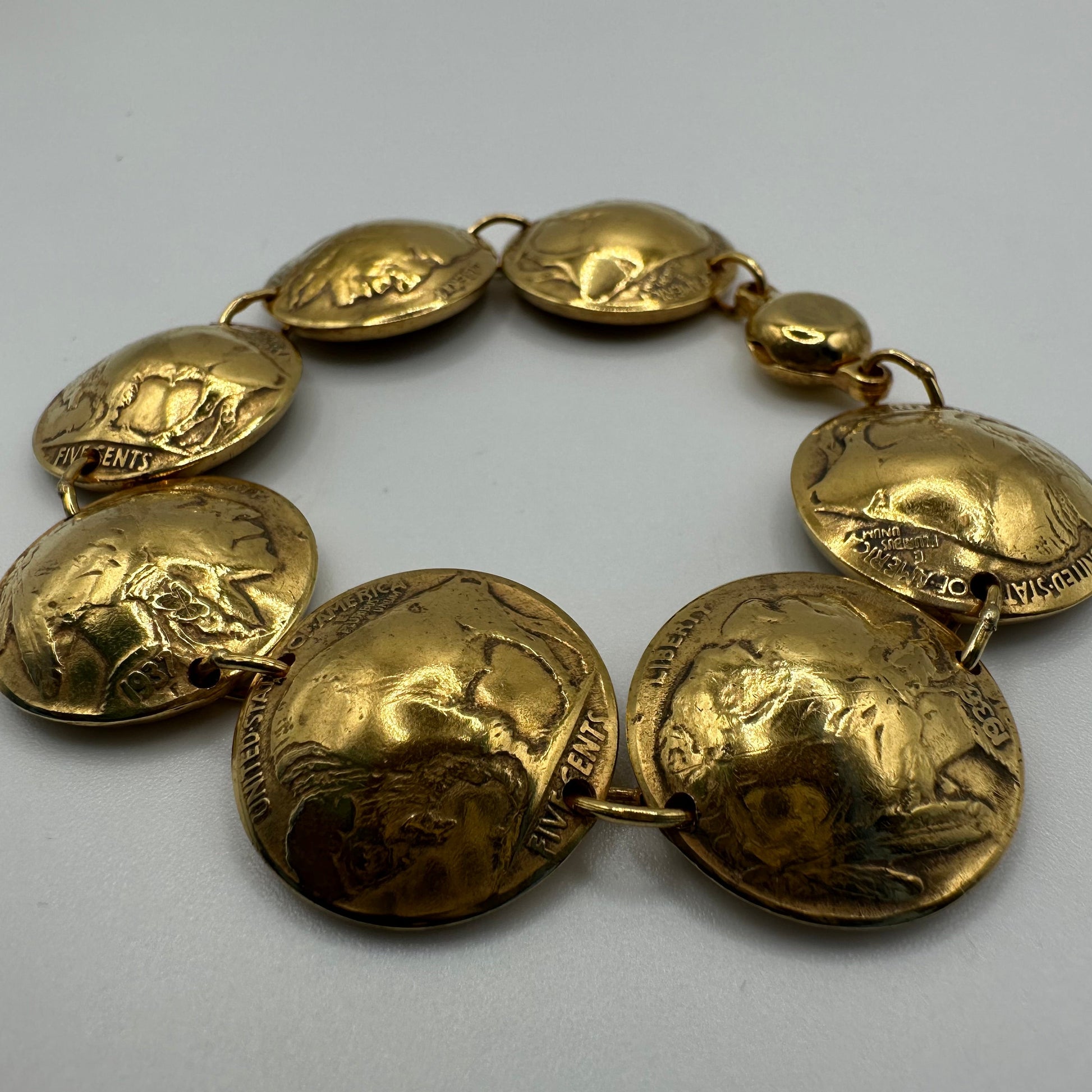 U.S. Buffalo Nickel Domed Coin Bracelet 24k gold plated on a white background. - Mountainstruck Coin Jewelry