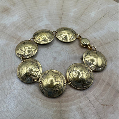 U.S. Buffalo Nickel Domed Coin Bracelet 24k gold plated on a light wood round. - Mountainstruck Coin Jewelry