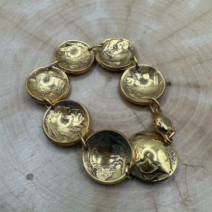 U.S. Buffalo Nickel Domed Coin Bracelet 24k gold plated on a light wood round. - Mountainstruck Coin Jewelry