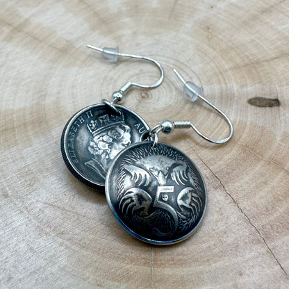 Australia Echidna 5 Cent Domed Coin Earrings on a light wood round. - Mountainstruck Coin Jewelry