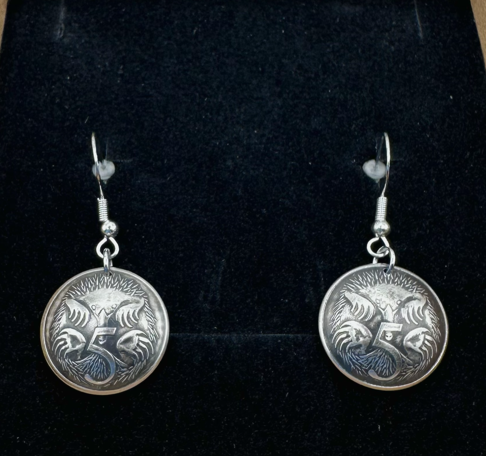 Australia Echidna 5 Cent Domed Coin Earrings in a brown kraft box on a black velvet background. - Mountainstruck Coin Jewelry