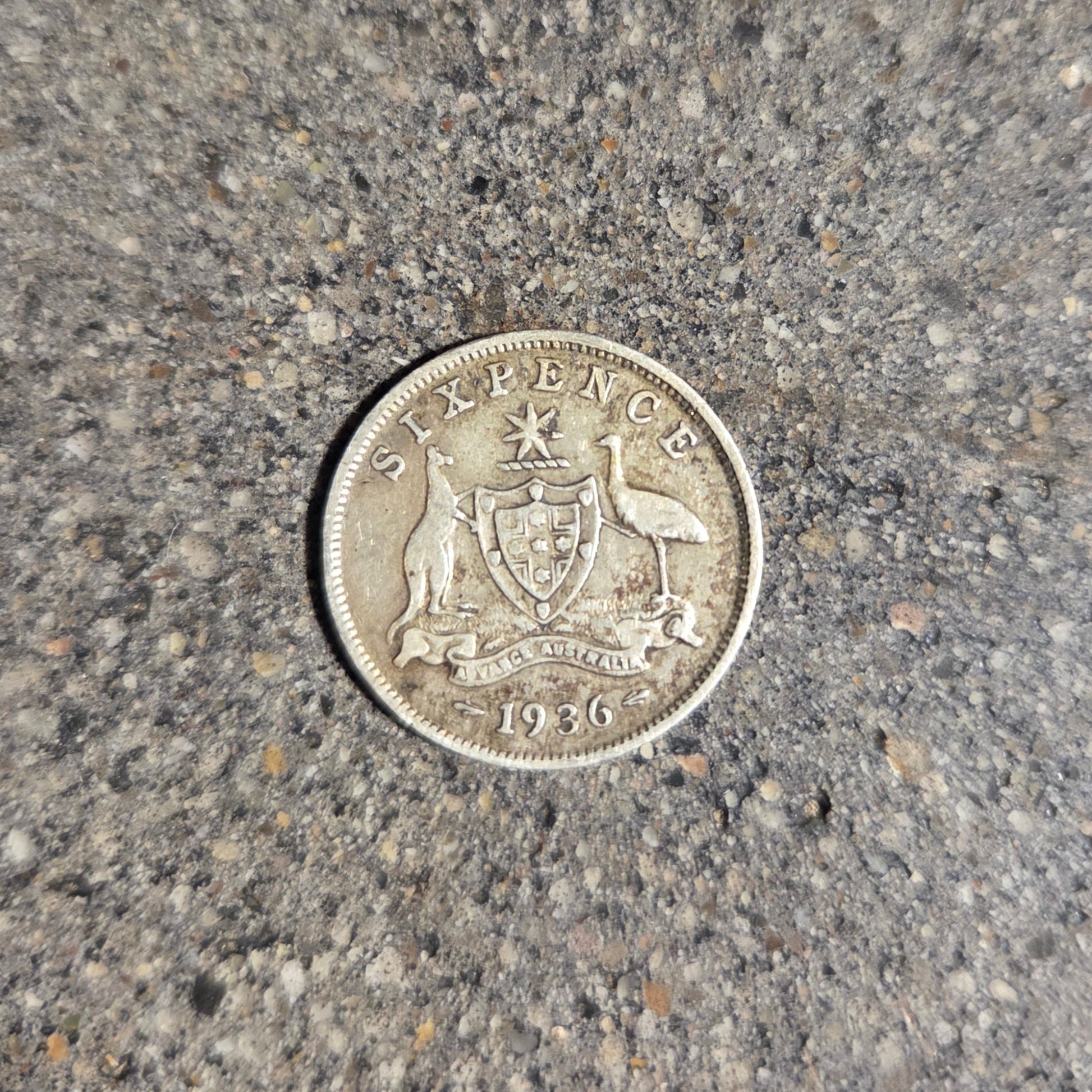 Australia emu kangaroo 6 pence silver coin on concrete background- Mountainstruck Coin Jewelry