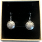 Canada 10 Cents Silver Domed Earrings in a brown kraft box on a black velvet background. - Mountainstruck Coin Jewelry