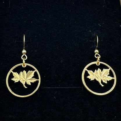 Canada Maple Leaf Hand Cut Coin Earrings 24k Gold Plated on black velvet background. - Mountainstruck Coin Jewelry