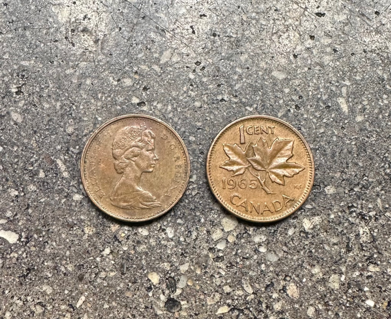 Canada Maple Leaf Penny on a concrete background. Front face on left side and back on right side of picture. - Mountainstruck Coin Jewelry