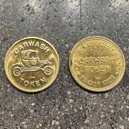 Carwash Token on a concrete background. Front of the token on the left side and back of token on the right side of the picture. - Mountainstruck Coin Jewelry