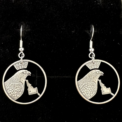 Idahome State Quarter Hand Cut Coin Earrings on a black velvet background. - Mountainstruck Coin Jewelry