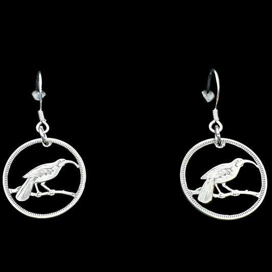 New Zealand Huia Bird 6 Pence Silver Hand Cut Coin Earrings on a black velvet background. - Mountainstruck Coin Jewelry