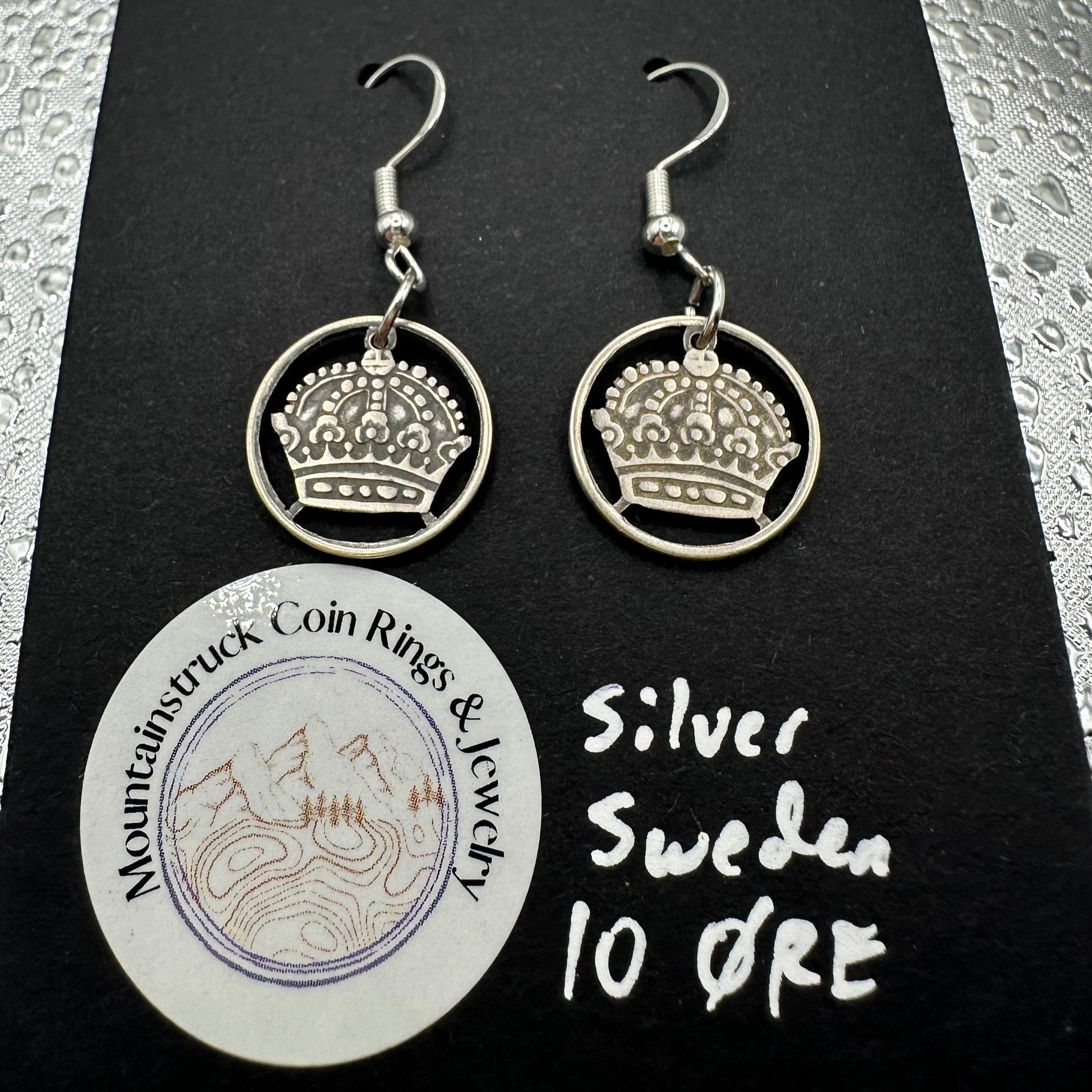 Sweden Crown 10 Ore Hand Cut Silver Coin Earrings on a black background. - Mountainstruck Coin Jewelry