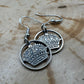 Sweden Crown 10 Ore Hand Cut Silver Coin Earrings on a wood background. - Mountainstruck Coin Jewelry