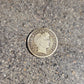 U.S Barber Dime Silver Coin front on a concrete background. - Mountainstruck Coin Jewelry