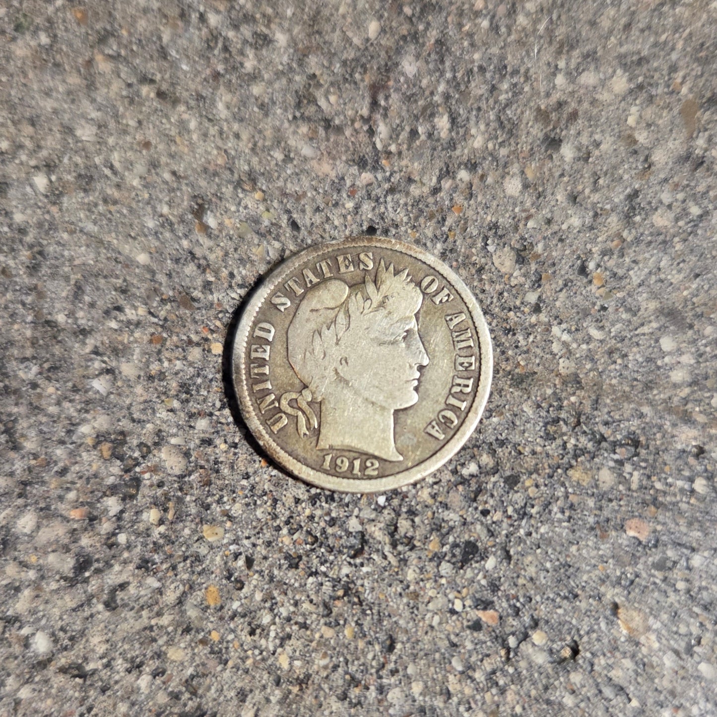 U.S Barber Dime Silver Coin front on a concrete background. - Mountainstruck Coin Jewelry